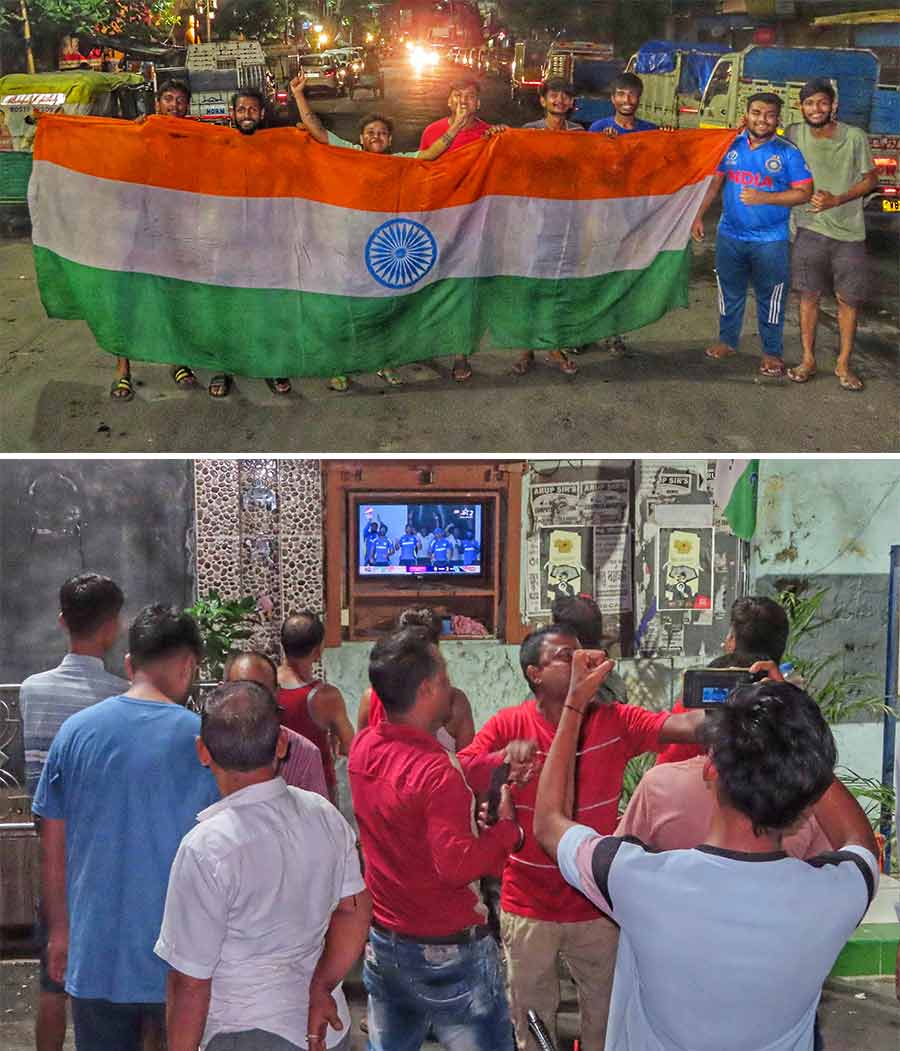 A gigantic Tricolour and an impromptu jig around the TV set at a ‘para’ club captured the emotions at Sashi Bhushan Dey Street in Bowbazar 