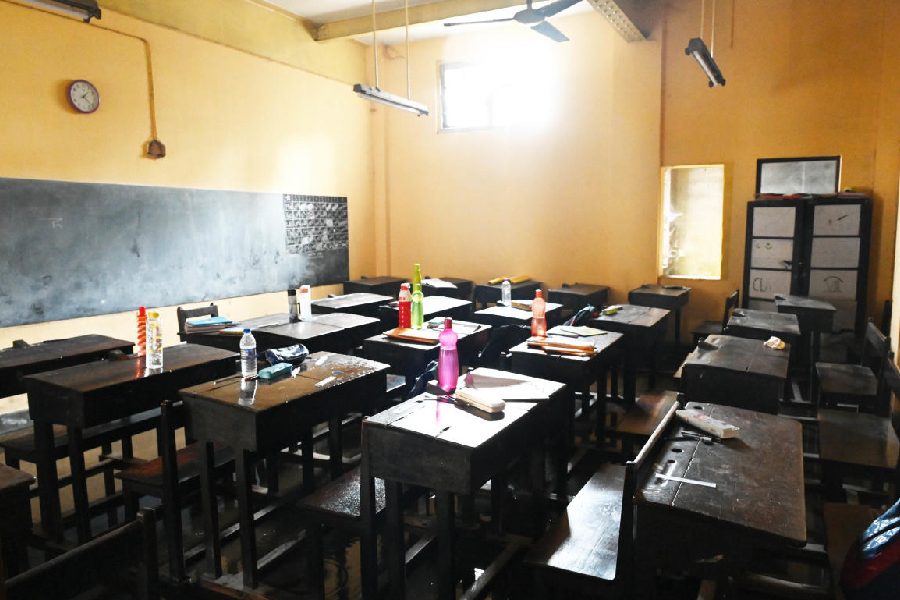 An empty classroom in a school on the Lee Memorial Mission-campus after the students were evacuated because of the fire on Friday.
