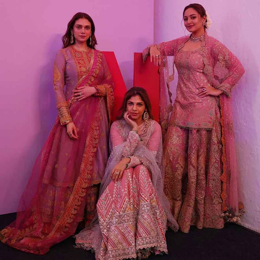 Actresses Aditi Rao Hydari and Sharmin Segal Mehta, who also star in the series, twinned with Sonakshi in pink ethnic ensembles. The period drama will follow the stories of love and betrayal experienced by courtesans living in Lahore’s oldest red-light district, Heeramandi. 