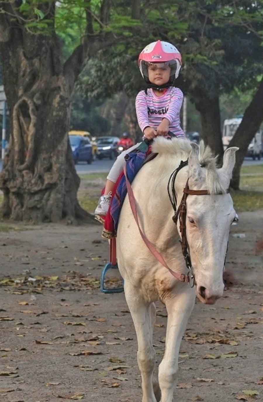 A child enjoys a pony  ride on the Maidan on Saturday 