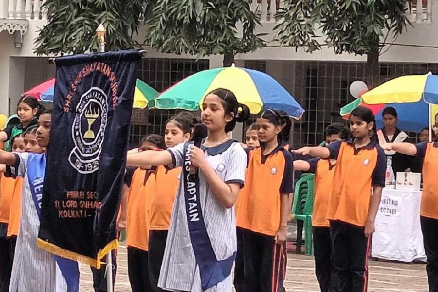 Junior students of Shri Shikshayatan School take part in an oath during their junior sports 