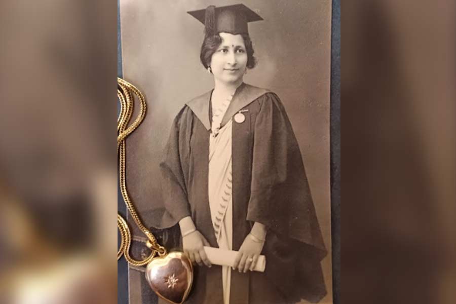 Kalyani Mallik in her MA graduation gown and sporting the Kamala Rani medal, Calcutta 1936, and her gold heart-shaped locket