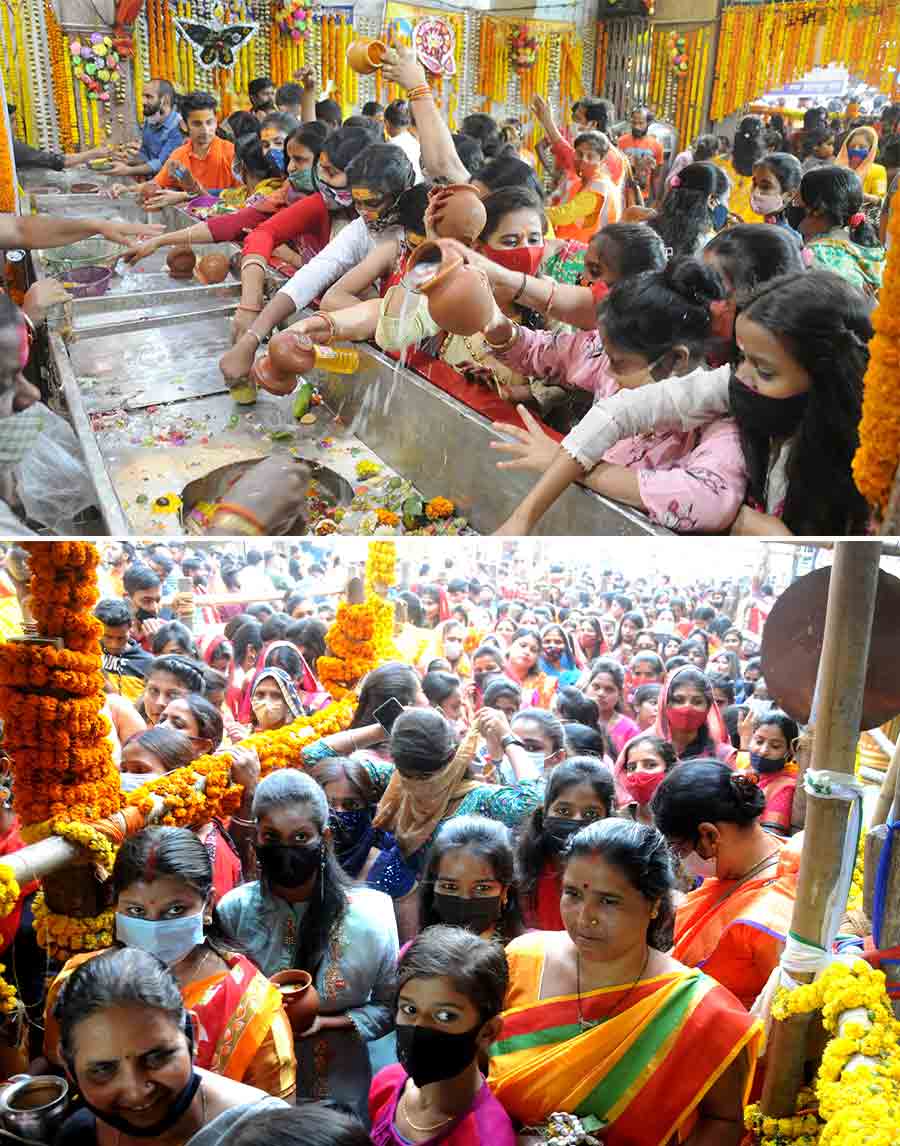 Women and girls take part in Maha Shivratri rituals at Bhootnath temple in Nimtala on Friday