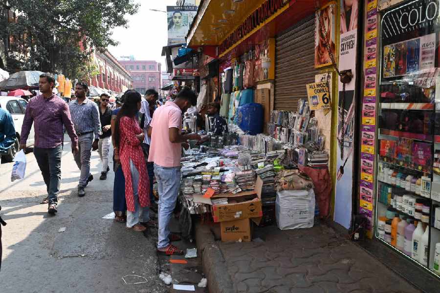 Stalls take up the entire width of a footpath in the New Market area on Wednesday.