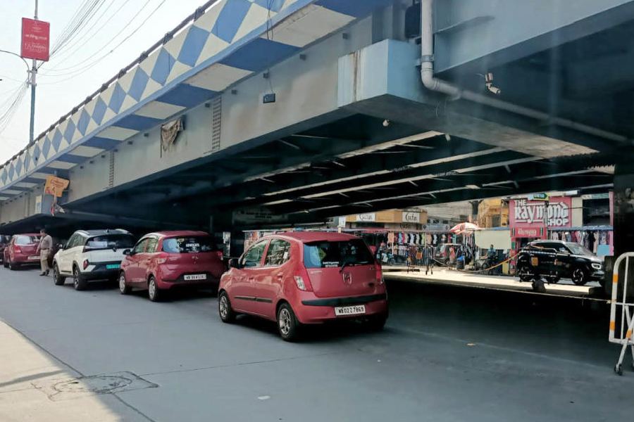 Cars parked on Gariahat Road on Friday. 