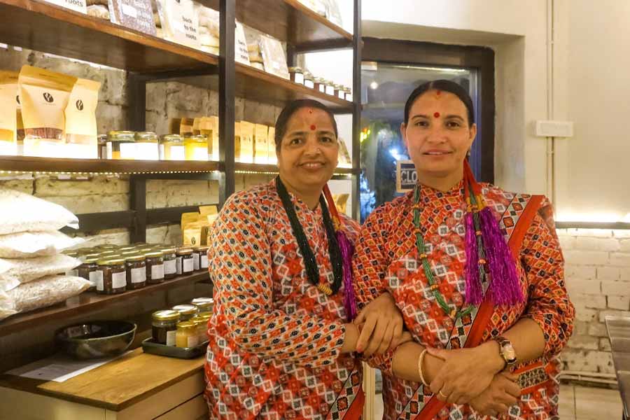 Manju Rizar and (right) Lolita Thapa brought their culinary expertise and produce from their own organic farms for the meal