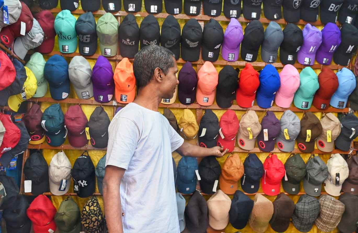 Summer caps are in high demand at Esplanade as the heat rages in Kolkata. The maximum temperature on Monday was 33°C 