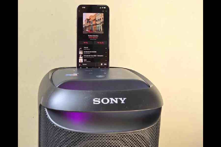There is space to keep your phone or other remote controls