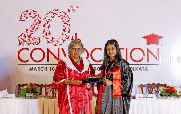 Suchitra Guha, Academic Council Member, GBS, handed over the graduation caps to the students of Batch 2021-23