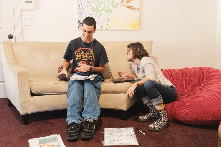 Jessica Jacobs with Persius Bahri, one of the students in her nontraditional school, at her home in Topanga, Calif., March 8, 2024. Inspired by true-crime shows that she binge-watched during the pandemic, Jacobs started working with a lawyer on cases that led to two men walking free after decades behind bars.