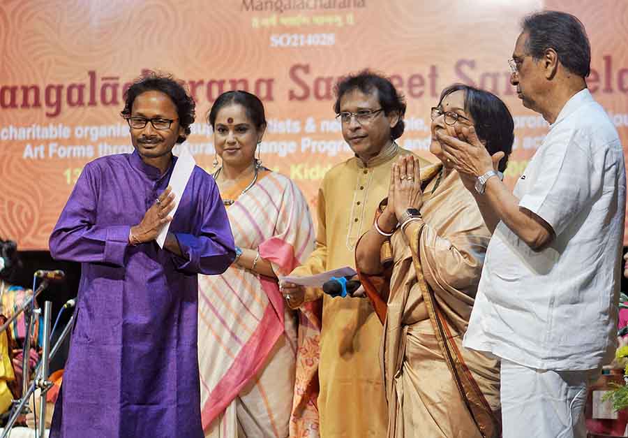 (From left) Among other tabla players, Samir Ranjana Maity was awarded the scholarship by Indrani Mukherjee, Apurba Mukherjee, Mamata Shankar and Amit Roy. Mangalacharana, a charitable organisation, aims to popularise Indian classical music among the young generation and help musicians to pursue their dreams