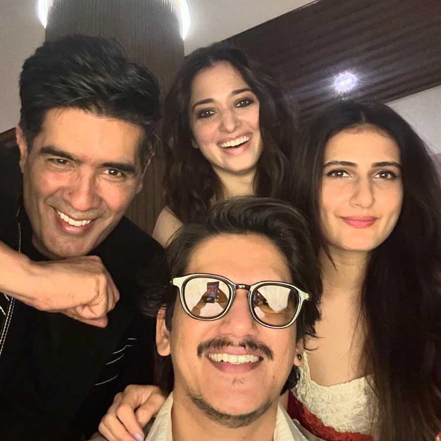 Vijay clicked a selfie with Manish, Fatima and Tamannah at the party.