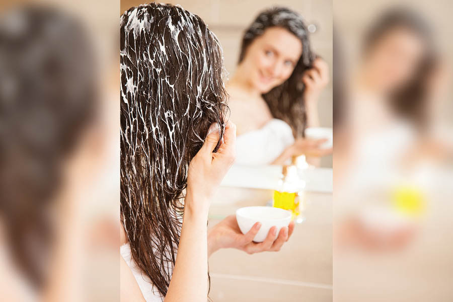 Between shampoo and conditioner, lather your hair with a mask