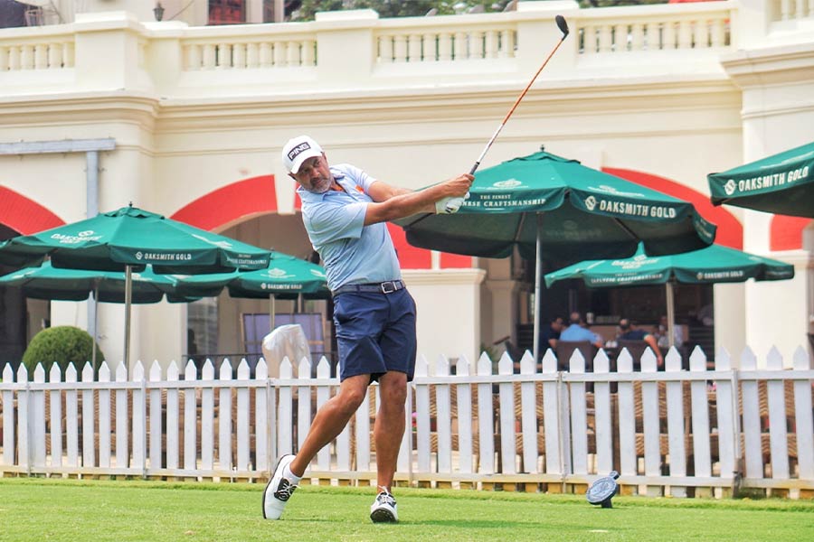 Arjun Atwal tees off at the Royal Calcutta Golf Club, where he is playing an international tournament for the first time since winning the Indian Open in 1999