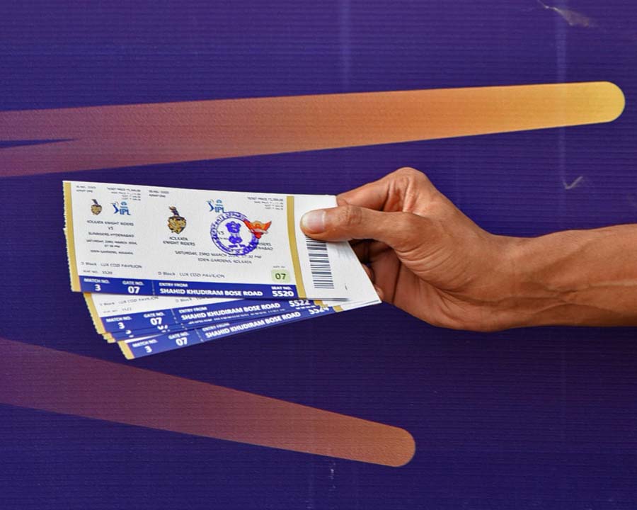 Another fan shows off his prized possession - three tickets to the first match of IPL Season 17 at the Eden Gardens - between the home team KKR and Sunrisers Hyderabad 