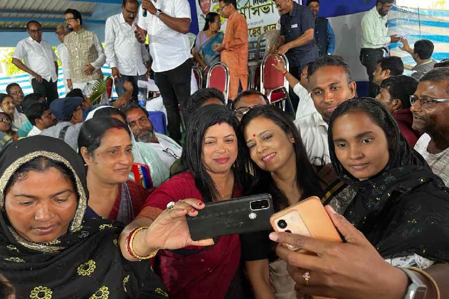 Moitra With party workers in Nadia during poll campaigning