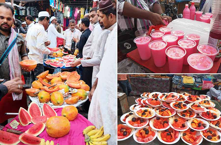 Observing the Ramzan month, people gather for Iftar to break their fast at Zakaria Street on Friday  