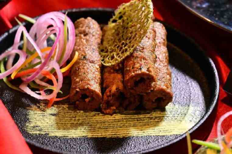 Gosht Malihabadi Seekh: These decadent and melt-in-the-mouth mutton seekh kebabs add in the flavour of fresh coriander and mint that cuts through the overly fatty taste. Grilled perfectly over charcoal, these are nothing short of a treat.