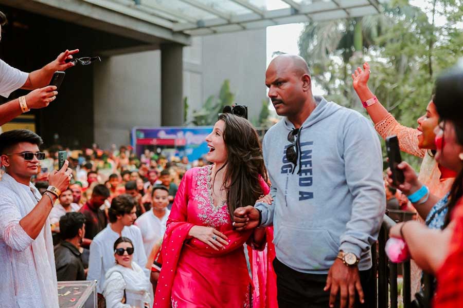 Nora, who plays Tasha in the film, entered the venue in a pink salwar kameez with silver leaf motifs on the plunging neckline. She wore her wavy hair down and went for a dewy makeup. A silver watch and statement ring accessorised her look. 