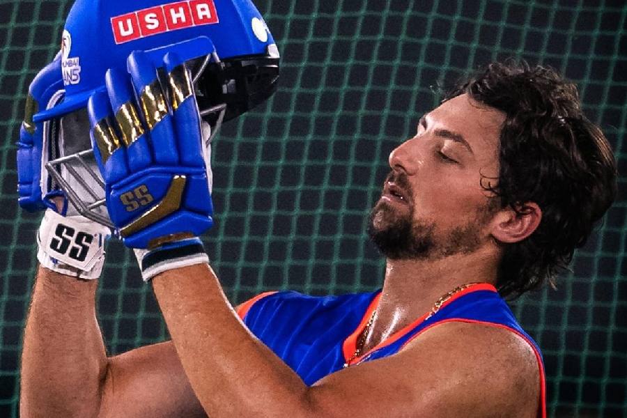 Mumbai Indians' Tim David, in a picture shared on X on Tuesday, at practice. The Australian could not finish the game in his team's first match and will like to make amends on Wednesday.