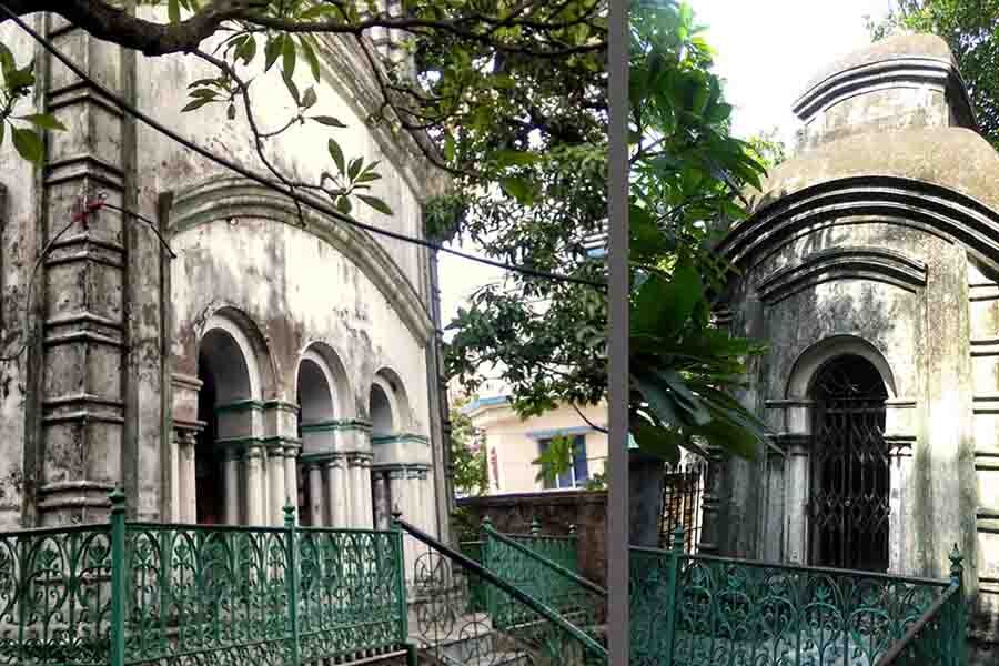  The decorative cast iron railings around the platform of Bhabatarini temple and (right) one of the two Shiva temples adjacent to it.