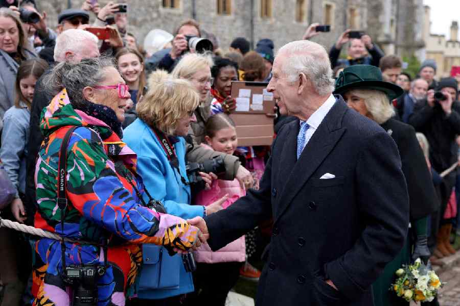 Windsor Castle | King Charles shakes hands, chats with crowd at most ...