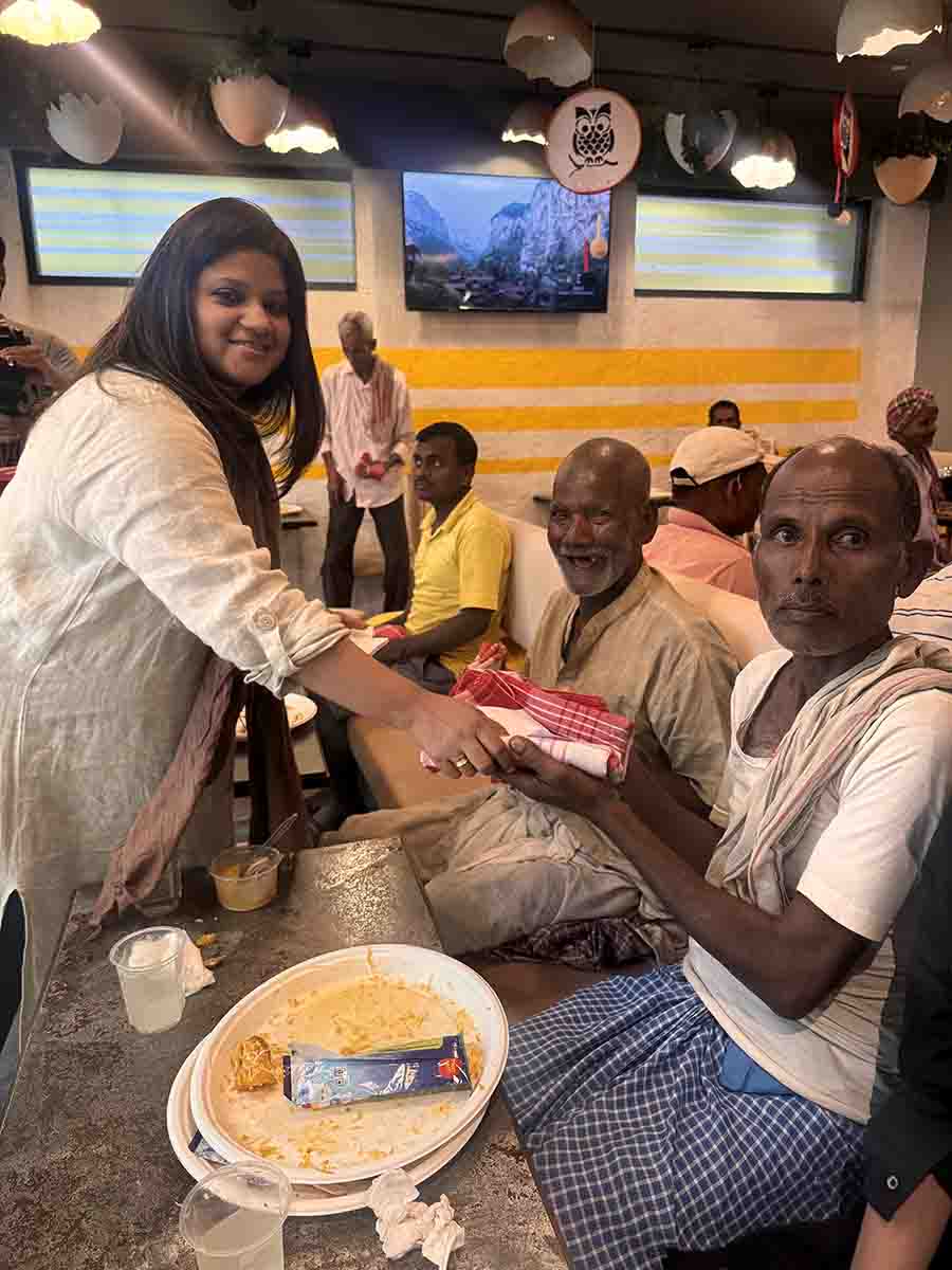 Towels and a token of love were distributed to them by Pradipta Chatterjee, co-owner of the cafe