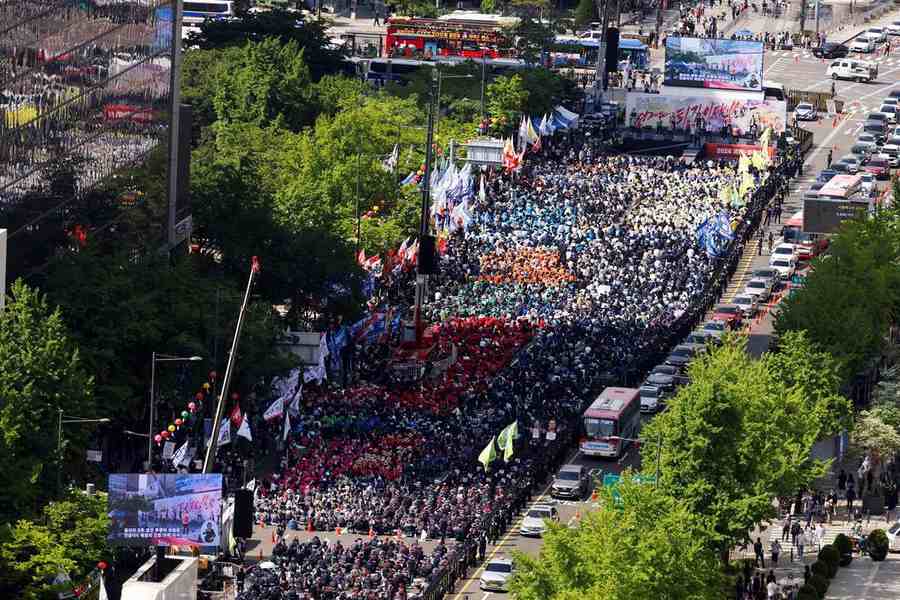 Protesters shouted pro-labor slogans at a rally in Seoul