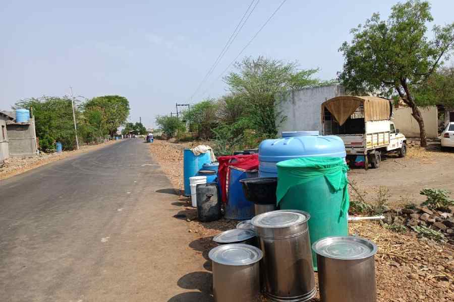 Drums await water tankers.