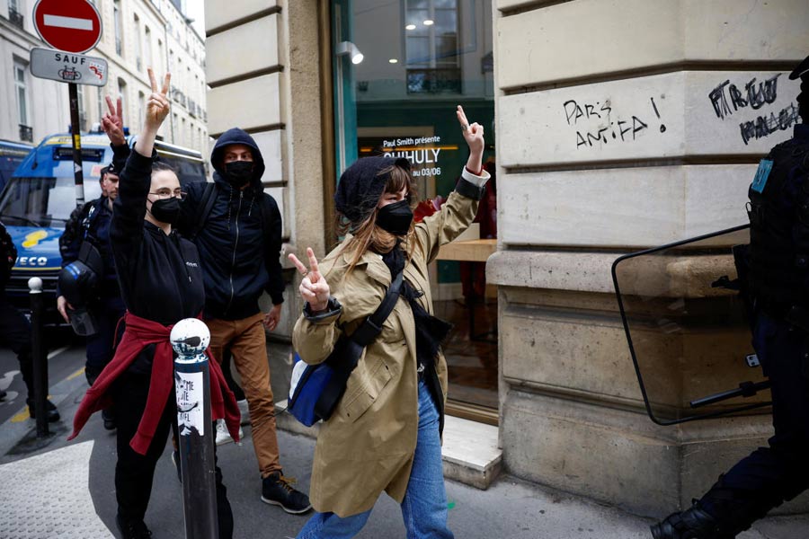 Protesters in support of Palestinians in Gaza are escorted away by police forces during the evacuation of the Sciences Po University, during the ongoing conflict between Israel and the Palestinian Islamist group Hamas, in Paris, France, May 3, 2024.