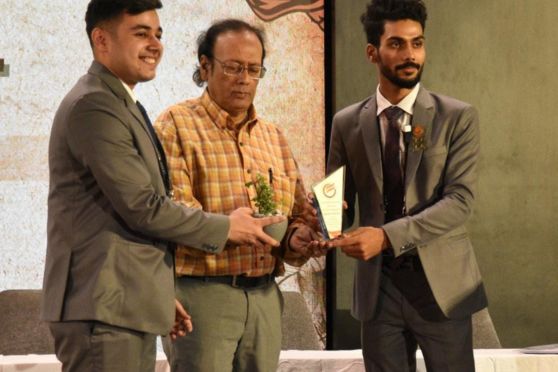 Prof Tridib Sengupta, Coordinator of the BBA Department, with student President Rishi Sharma and student Vice President Devesh Sharma.