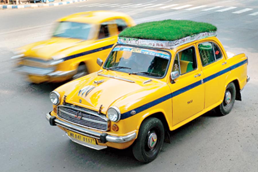 Dhananjay Chakraborty’s ‘Sabuj Rath’ whizzes past a common yellow cab 