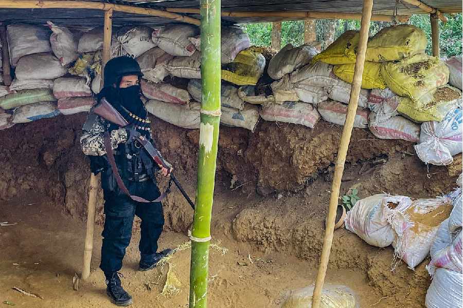 A 'village volunteer' stands guard at a bunker set up in conflict-hit Manipur