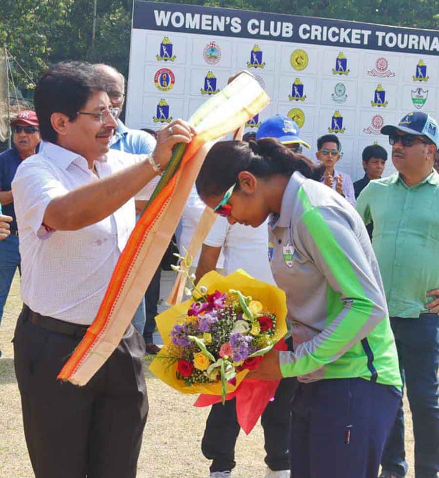 Cricket Association of Bengal (CAB) president Snehasish Ganguly greets a player at the CAB Women's Club Cricket League one-Day tournament hosted by the Cricket Association of Bengal, which began at the Town Club ground, on Wednesday  