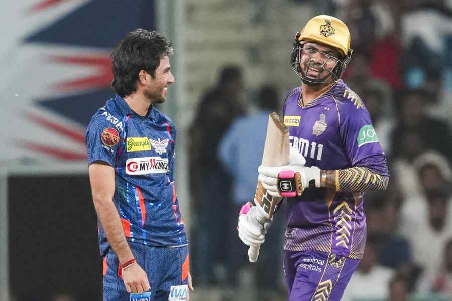 Lucknow Super Giants spinner Ravi Bishnoi (left) smiles at Sunil Narine after dismissing the Kolkata Knight Riders all-rounder in Lucknow on Sunday. But before Bishnoi finally had his man, Narine unleashed hell on the home team with an innings of 81 off 39 balls.