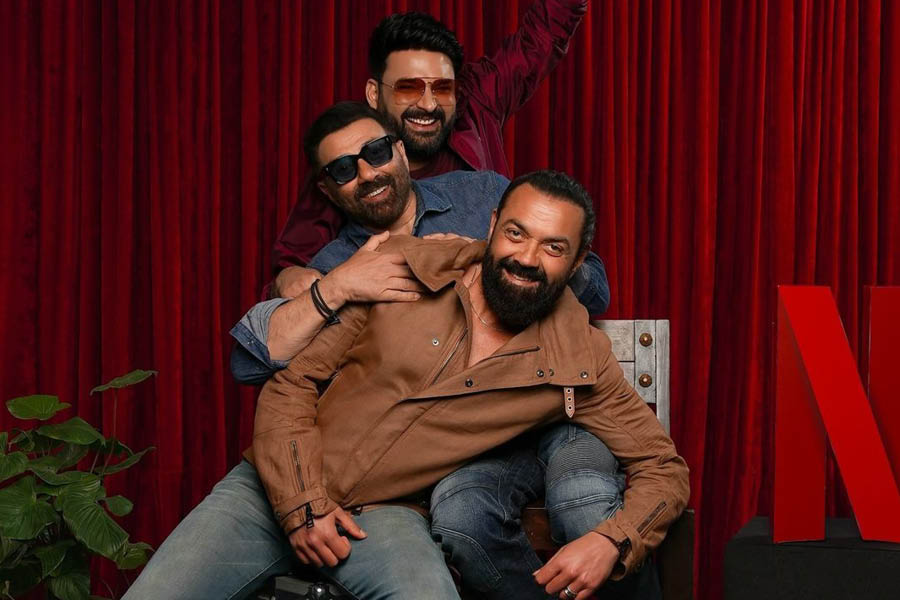 Kapil Sharma (back) with Sunny (centre) and Bobby Deol (front).