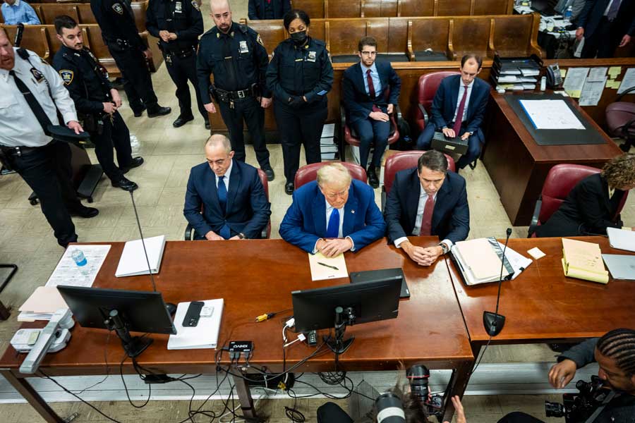 FILE — Former president Donald Trump attends his criminal trial at the New York State Supreme Court in New York, on Friday, May 3, 2024. The judge in Trump’s criminal trial in Manhattan on Monday held the former president in contempt and fined him $1,000 for once again violating a gag order prohibiting him from attacking witnesses or jurors. 