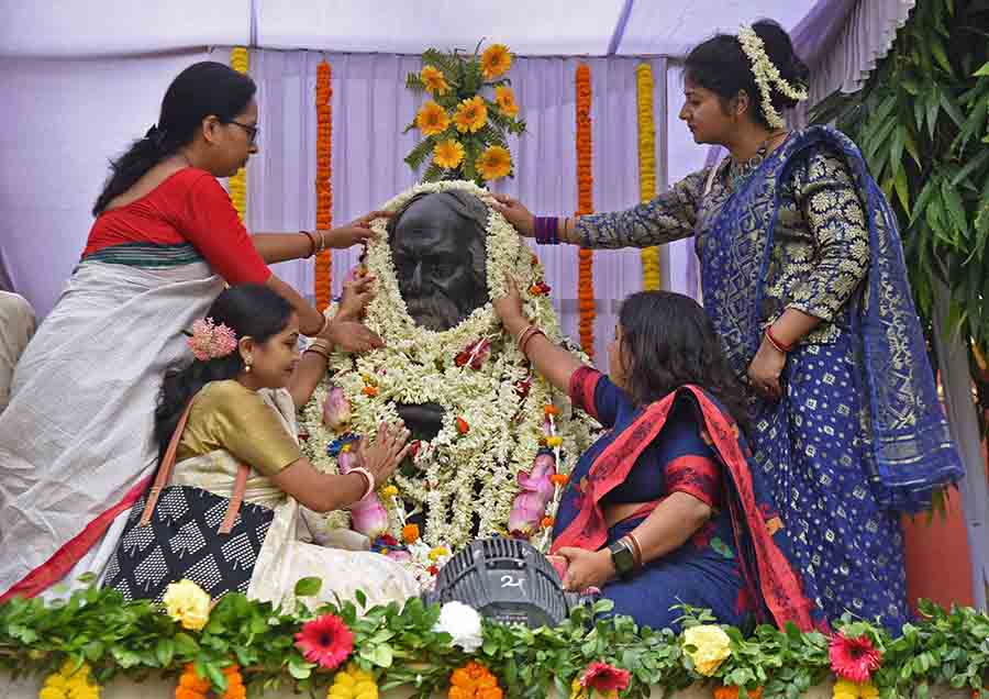 The flower-bedecked statue of Rabindranath Tagore on the lawn of Jorasanko Thakurbari on Wednesday