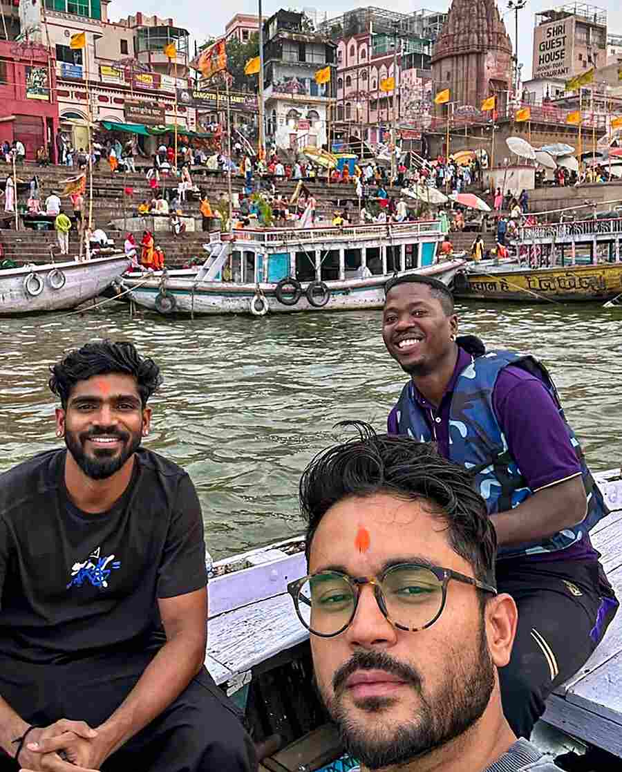 Kolkata Knight Riders players Manish Pandey, KS Bharat and Sherfane Rutherford take a boat tour in Varanasi on Tuesday,