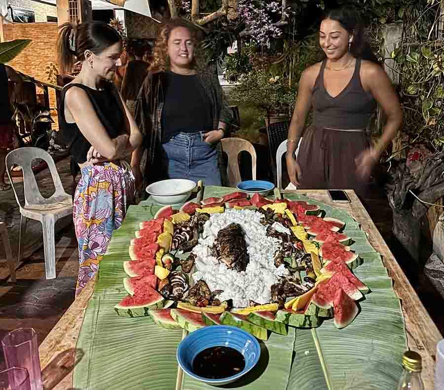 I spent a month on Siargao island in the Philippines in March-April. I cooked quite a bit but sometimes went out to eat, too. One of the interesting gastronomic experiences was Boodle Fight, a typical community meal in the Philippines. All the food is laid out on the table and people help themselves and eat right off the banana leaves. All eating is done with hands. The ‘fight’ is basically trying to consume as much food as you can before the others! My neighbours at my homestay were an Australian woman and a local man. They invited friends over for a barbecue and invited me over 