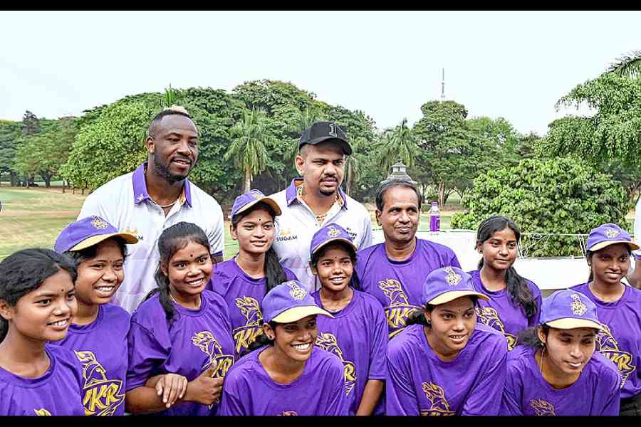 An ecstatic set of girls from Shreeja India were photographed with their favourites Knights, Andre Russell and Sunil Narine