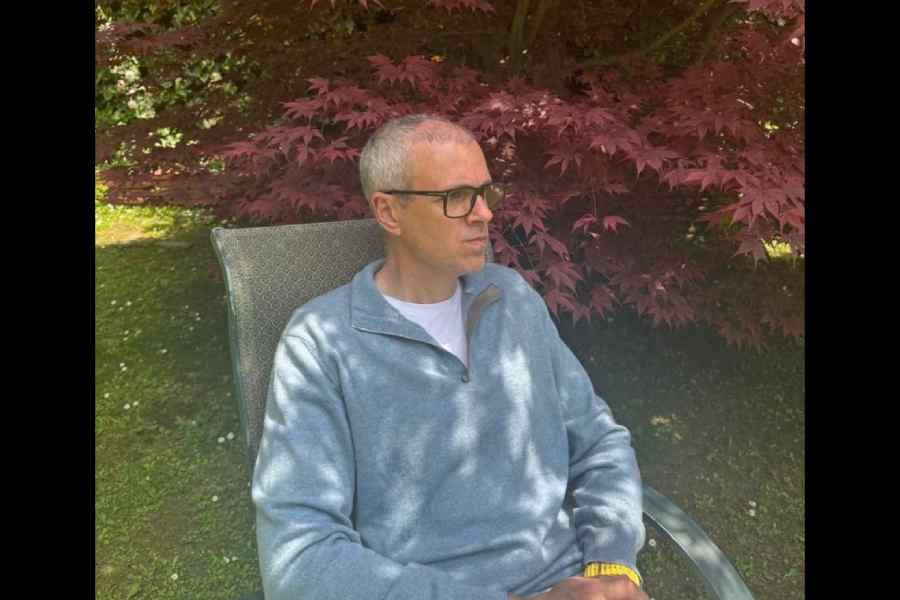 Omar Abdullah on the lawns of his residence