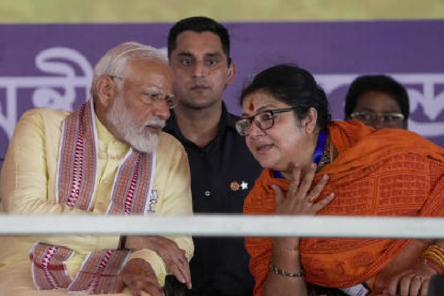 Prime Minister Narendra Modi with BJP’s Hooghly candidate Locket Chatterjee at Chinsurah on Sunday