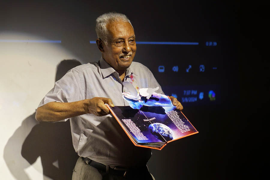 A happy grandfather with a priceless gift for his granddaughter — Pradip Sengupta displaying the ‘Abol Tabol’ pop-up