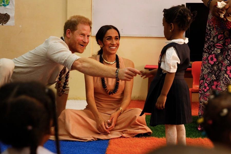 The Duke and Duchess of Sussex at the Lightway Academy in Abuja, Nigeria.