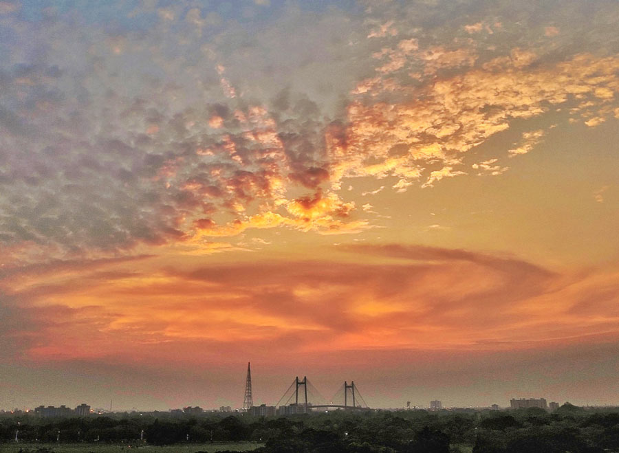 On Wednesday evening, the partly cloudy sky turned golden around sunset  
