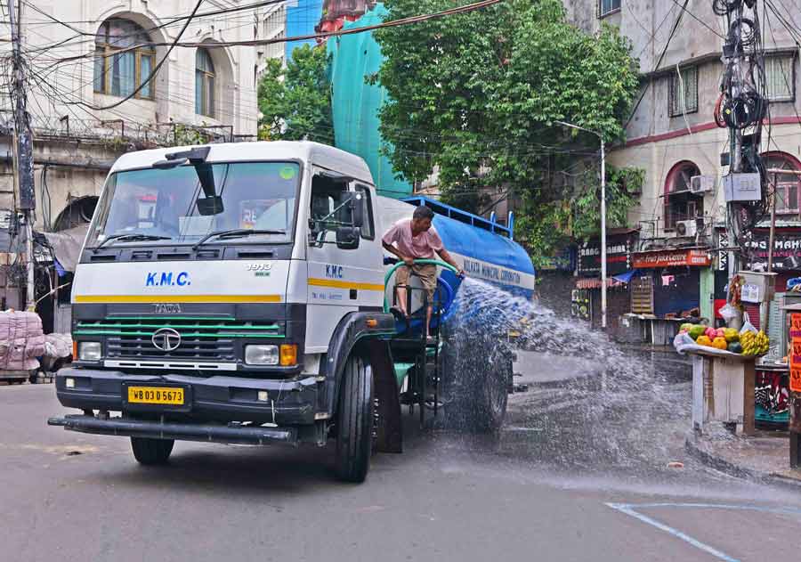 In an effort to keep Kolkata clean, every morning KMC water tankers wash important roads of Kolkata. One such tanker was seen in front of KMC headquarters on Thursday  