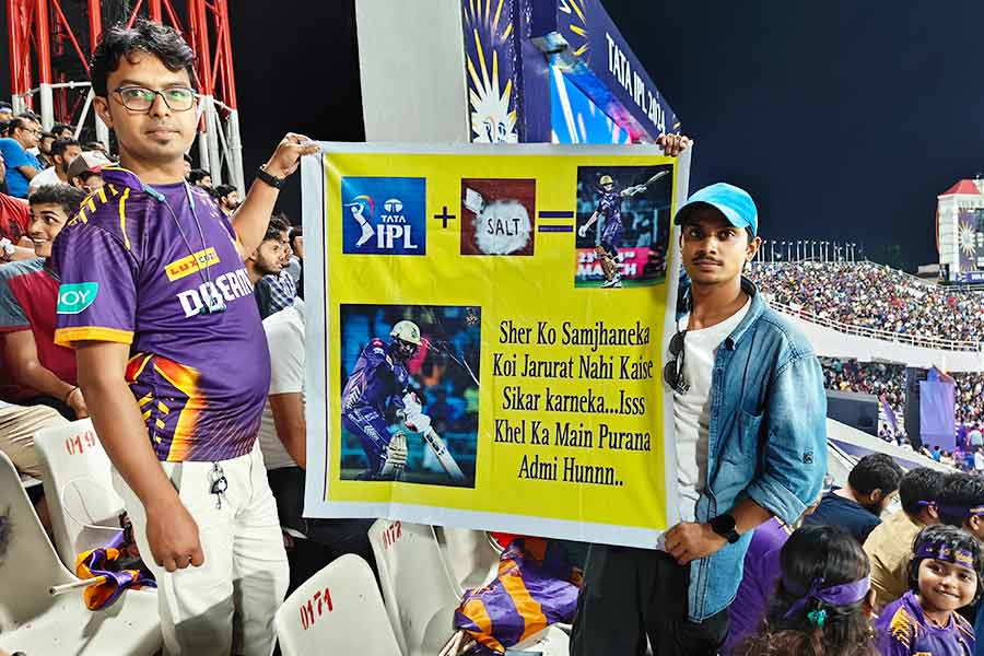 KKR fan Raj Chand (right)