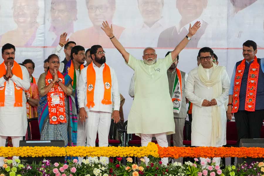 Prime Minister Narendra Modi with Maharashtra Chief Minister Eknath Shinde, Deputy Chief Minister Devendra Fadnavis and Maharashtra Navnirman Sena (MNS) chief Raj Thackeray during a rally for Lok Sabha elections, in Mumbai, Friday, May 17, 2024.
