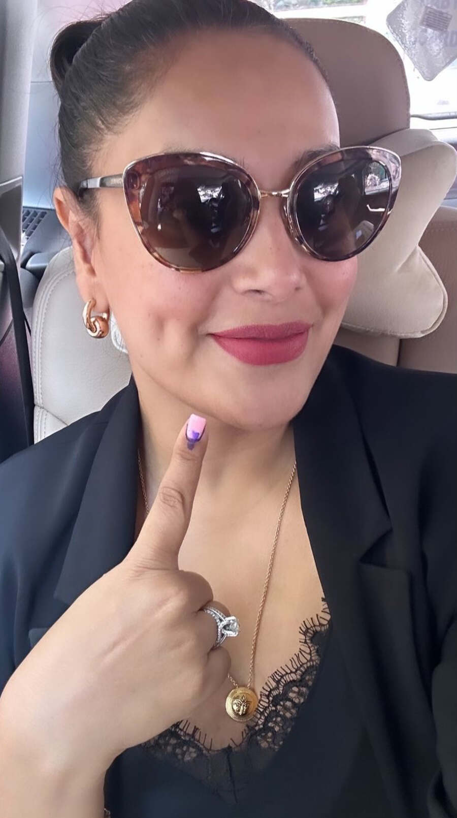 Bipasha Basu opted for a black nylon blazer over a lacy top and brown shades for polling day. “Choose the country you want! Go Vote,” she wrote.